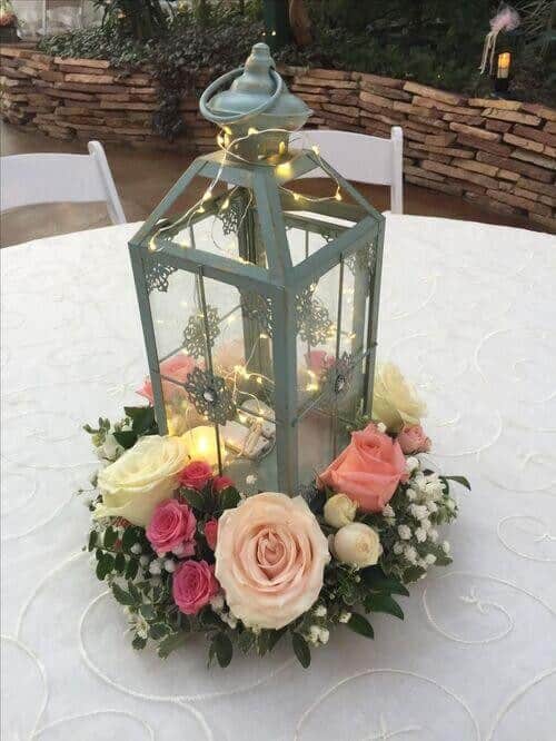 Grey lanterns surrounded in florals