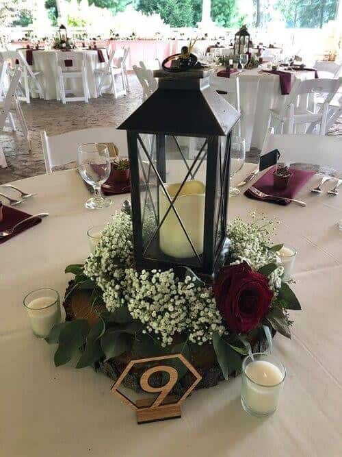 Dark lantern accents with dark red roses