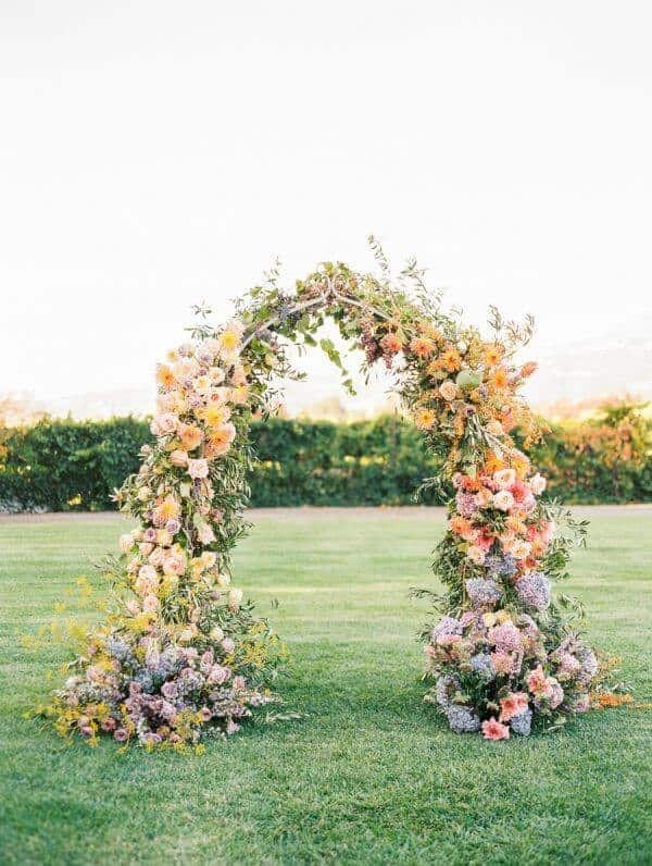 Color bomb floral arch