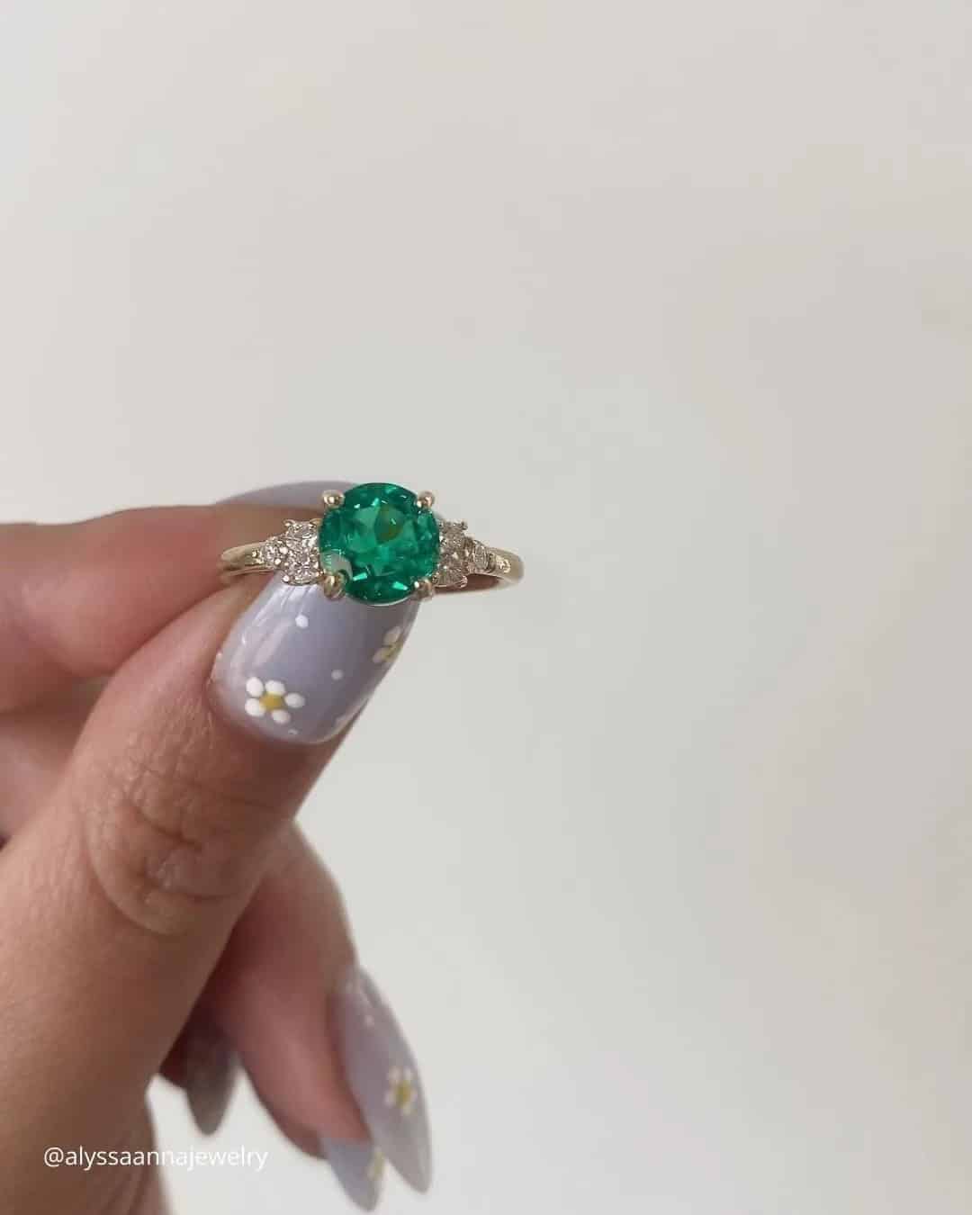 Round Cut Emerald Engagement Rings