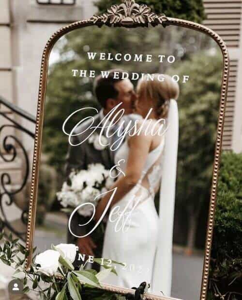 Written welcome sign on a giant mirror