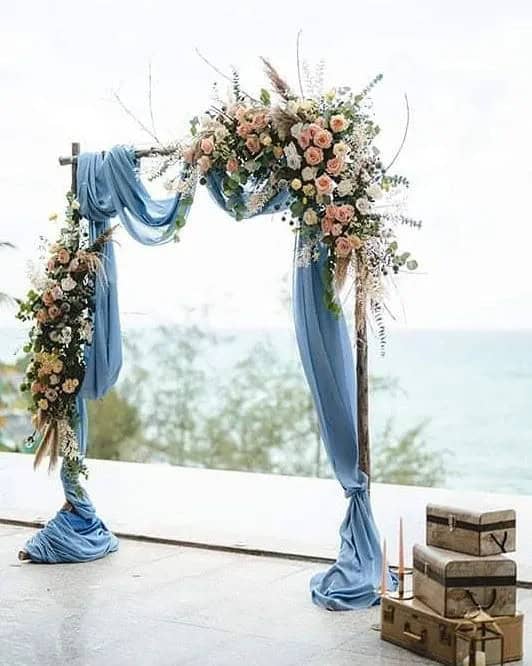 Arch For Teal And Rust Wedding