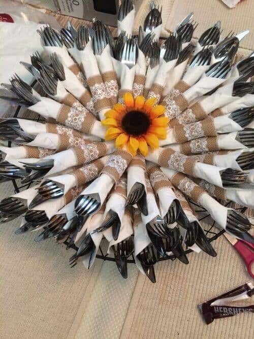 Cutlery wrapped in burlap and lace