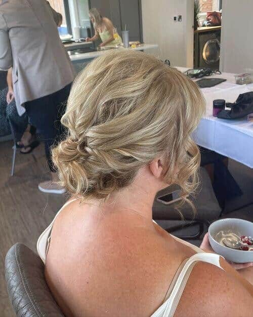 14 Subtle Fishtail Braids Twisted into a Small Chignon