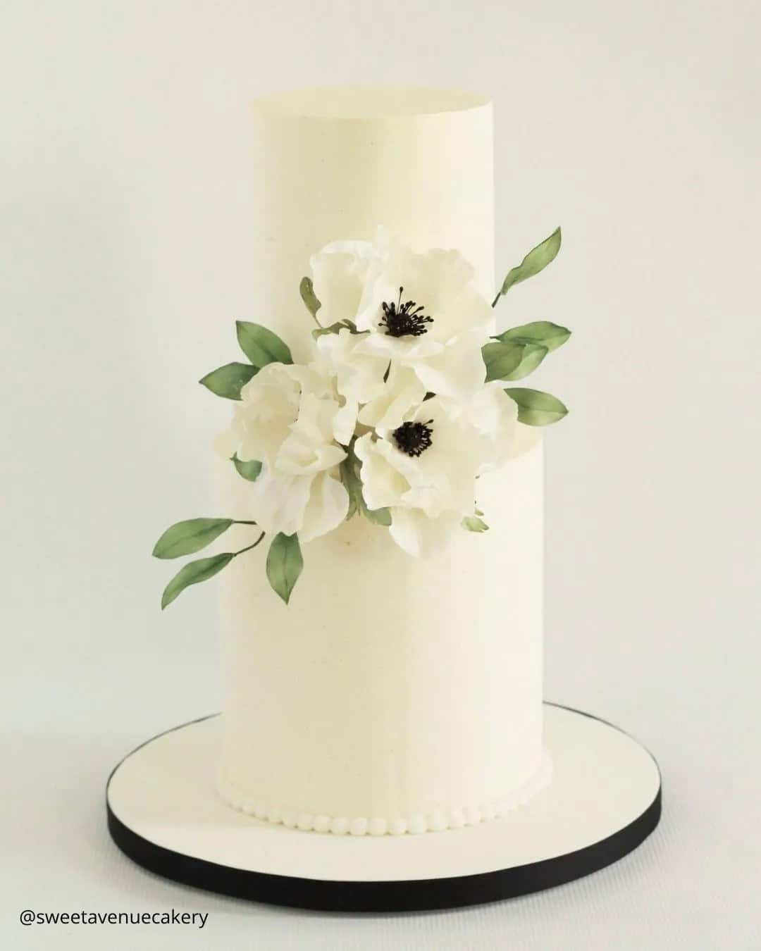 White Cakes With Flowers Decorations