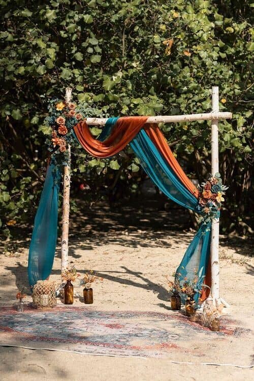 Blue and orange draped arch