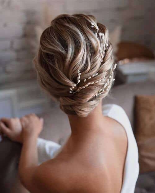 Twisted braid and low bun style