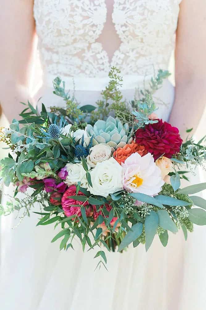 White And Burgundy Flowers In Greenery Bouquets