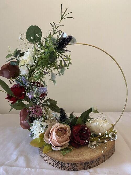 Dark red, pink, and white centerpieces