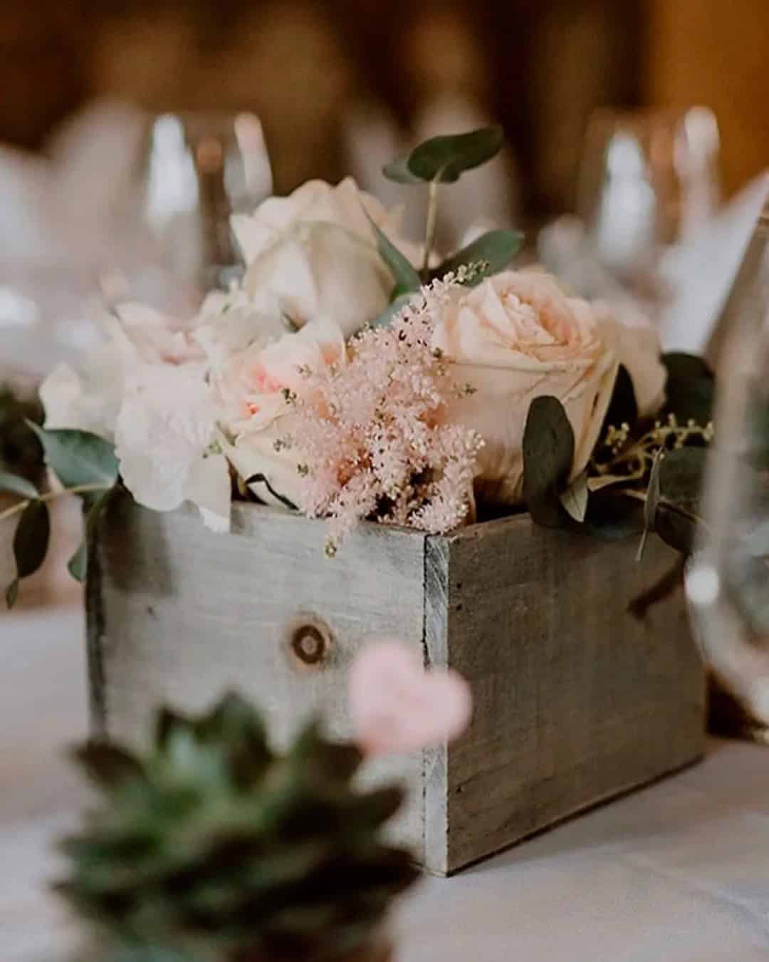 Green Centerpiece In Wooden Planters