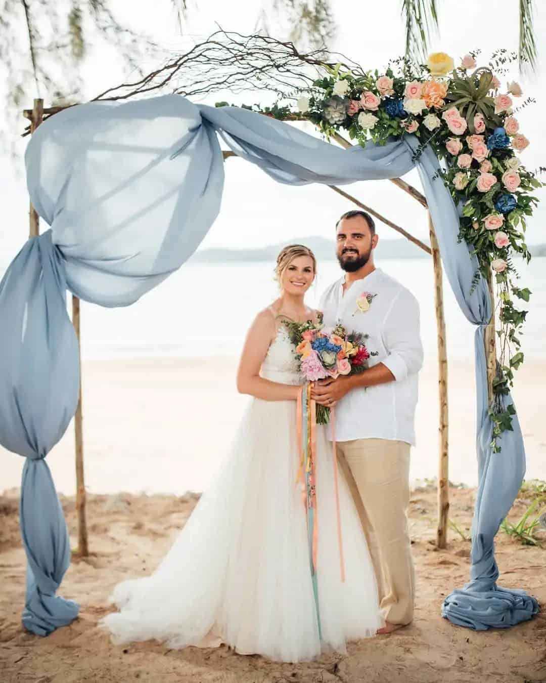 Arch For Teal And Rust Wedding