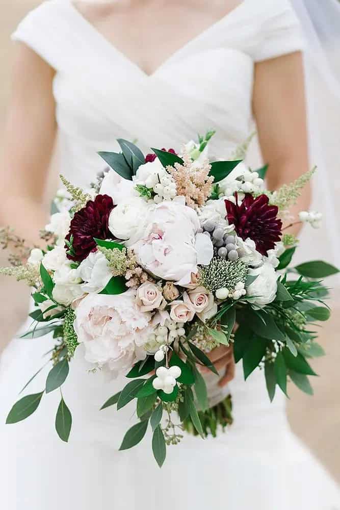 White And Burgundy Flowers In Greenery Bouquets