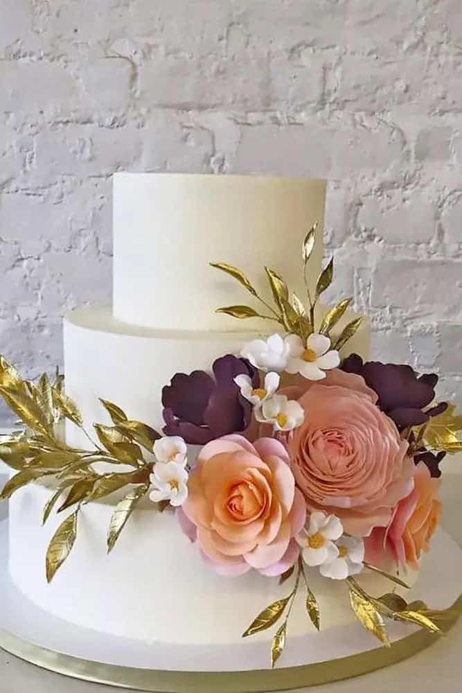 White Cakes With Colorful Flowers