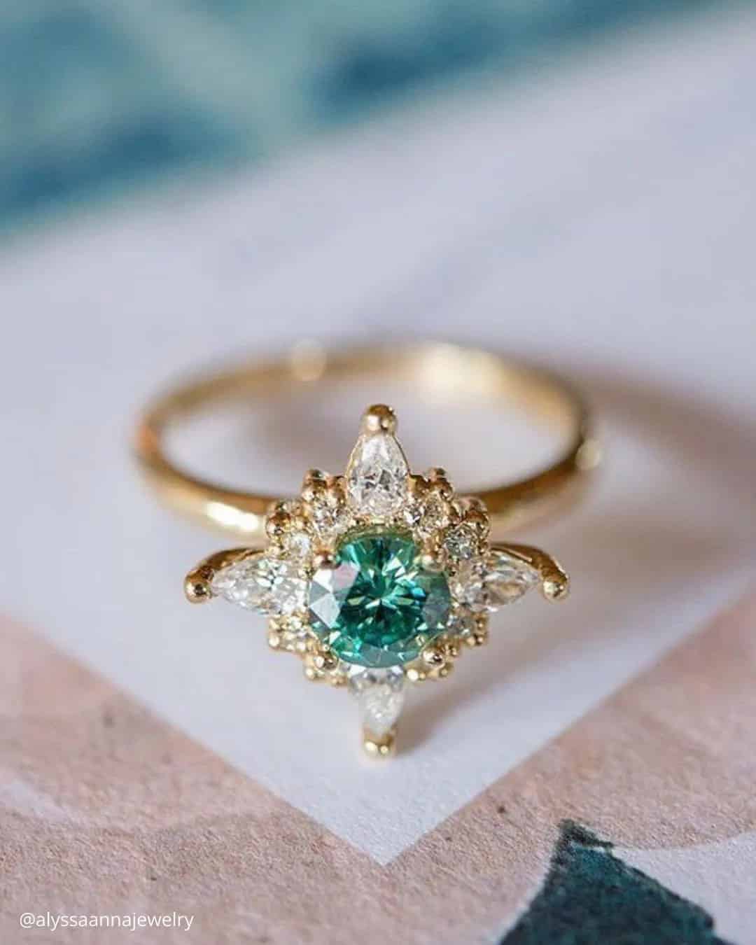 Round Cut Emerald Engagement Rings